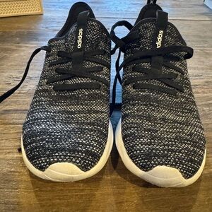 Adidas women’s Black and White Sneakers with Sock-Like Fit